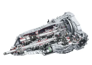 Cutia S tronic cu 7 trepte longitudinală din generația 2015+ (identificată ca DL382: ambreiaje dispuse axial, volantă cu pendul centrifugal), secțiune — ilustrație Audi pentru lexiconul tehnic, 2017; pagina sursă nu numește codul intern