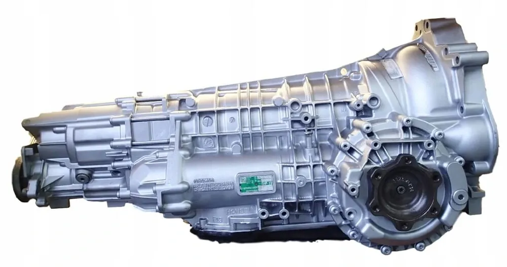 Cutie ZF 5HP19 (VAG 01V, cod 01V300050B, literă FAZ) de pe Audi A8, completă, vedere laterală cu partea de ieșire; anunț de dezmembrări iZAP24 „КПП Audi A8 01V300050B 5HP19 FAZ”