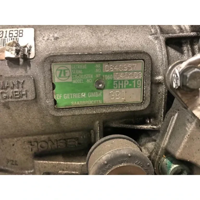 Eticheta ZF de pe carcasă: model 5HP-19, listă de piese 1060 040 103, cod VAG GBJ (Audi A4 / A6), ZF Getriebe GmbH Saarbrücken; anunț Hermes Motors